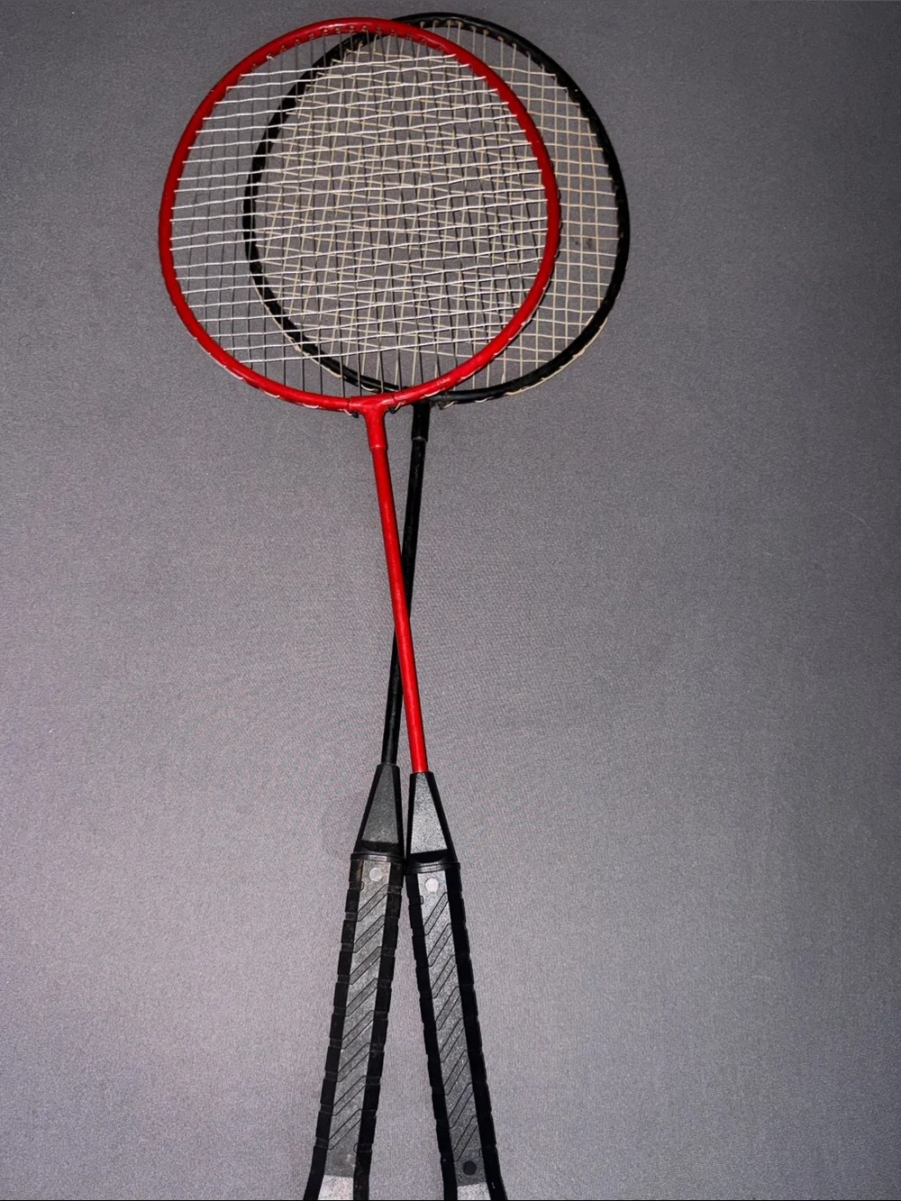 Red and Black Badminton Racket Pair